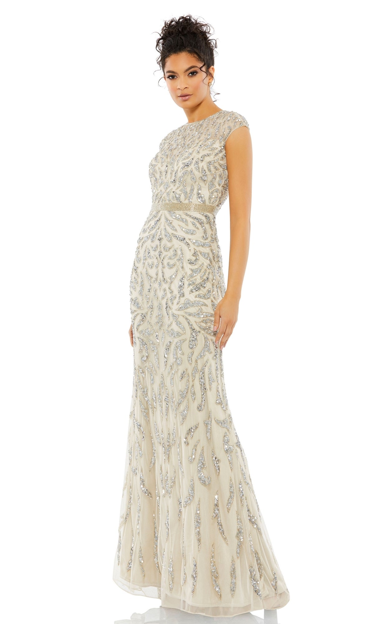 A woman models the Silver Long Sequin Formal Dress: Mac Duggal 5532, an elegant floor-length gown with silver embellishments, ideal as a mother of the bride dress, against a plain white backdrop.